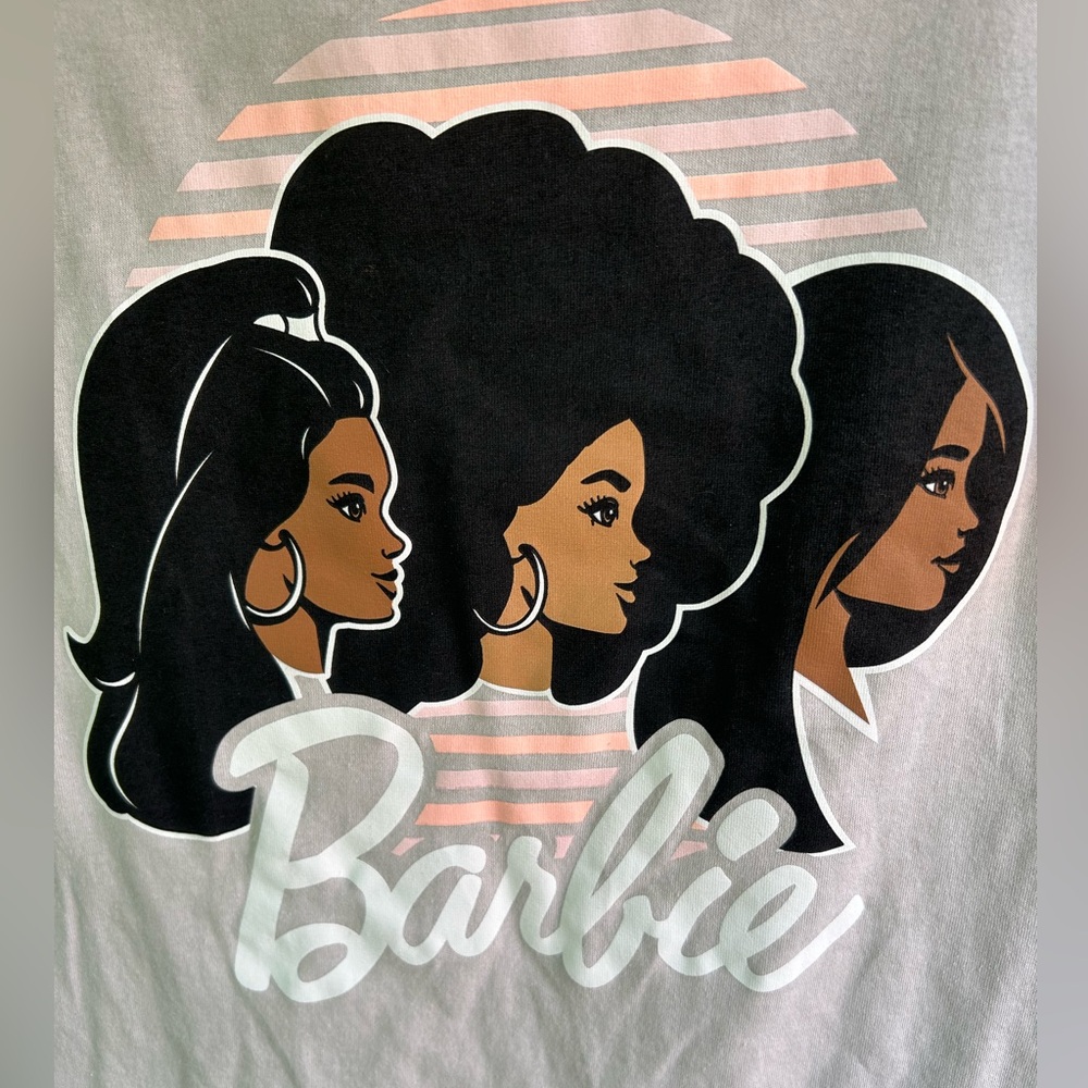 NWT Barbie T-shirt with cute Graphics on the front. Bought from Rue 21.